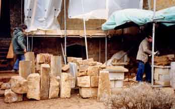 Workers refurbish the stone work of Broughton Castle